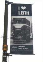 Among the banners adorning lampposts down Leith walk on 3 January 2011 is this one depicting a Pickering Standard tramcar on route 17, coming up from the 'Fit o' The Walk' in the mid 1950s. The destination is Newington Station where the tram would terminate in the middle of a road which wouldn't have been quiet even then. The plan is that trams will one day run again down Leith Walk, but who knows when? This is a bit of a sore point in Edinburgh. <br><br>[David Panton 03/01/2011]