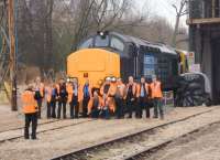 The track recording service at Middleton Towers on 24 February 2010 with technical staff posing for a group photograph in front of DRS 37423 and the Network Rail observation car <I>'Caroline'</I>.<br><br>[Ian Dinmore 24/02/2010]