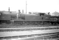 C15 no 67460 stands in the yard at Eastfield on 25 July 1959. This was one of the push-pull locomotives used on the Craigendoran - Arrochar service for many years along with classmate 67474. [See image 24286]<br><br>[Robin Barbour Collection (Courtesy Bruce McCartney) 25/07/1959]
