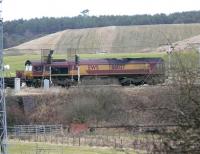 DBS 66037 climbs to Cobbinshaw with 6E28 Dalzell - Tees Yard steel empties at 14.27 on 5 February.<br><br>[Ken Browne 05/02/2011]