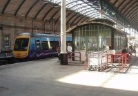 Hull Paragon station is impressive from any angle and contains lots of interesting features, not least this waiting room on one of the platforms. A Trans Pennine Clas 170 is waiting alongside for its next duty. <br><br>[Mark Bartlett 19/03/2011]