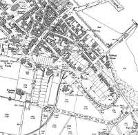 An extract from the 1899 map of Campbeltown showing the original terminus of the light railway, prior to the introduction of passenger services. At this time coal from the collieries between here and Machrihanish was probably the sole traffic. Later the railway was extended onto the quayside via reclaimed land on the foreshore. [See image 33469]<br><br>[Mark Bartlett //1899]