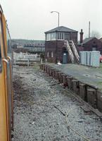Daisyfield box, level crossing and former Blackburn-bound platform (now removed) seen from a 47456 hauled train diverted from the WCML due to engineering works and heading north for Hellifield. Taken on the 25th of March, 1989.<br><br>[Ewan Crawford 25/03/1989]