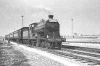 Ex-NBR 4-4-0 <I>Glen Douglas</I> with the SLS/MLS 'Carlisle Rail Tour' standing in a siding alongside Kingmoor Yard on 6 April 1963 during a photostop.<br><br>[K A Gray 06/04/1963]