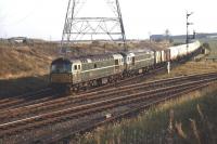 Class 26 locomotives D5306 + D5300 approaching Niddrie North Junction from the Millerhill direction on 13 October 1970 with a block train of chemical tanks. Newcraighall Colliery stands in the right background.<br>
<br><br>[Bill Jamieson 13/10/1970]