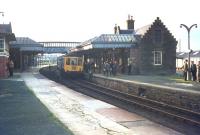 Photostop at Forfar. A <i>Railway Society of Scotland</i> DMU special calls at Forfar with a railtour on 12 October 1968, just over a year after the station had lost its scheduled passenger services.<br><br>[Bruce McCartney 12/10/1968]