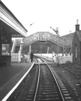 Walkerburn station viewed from the rear of the 11.15 Galashiels-Peebles-Edinburgh train on the last day of service, 3rd February 1962.<br><br>[Frank Spaven Collection (Courtesy David Spaven) 03/02/1962]