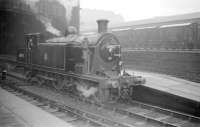 St Margarets C16 4-4-2T no 67492 at Princes Street on 6 September 1958 in connection with the SLS (Edinburgh Section) <i>Lothian Lines Tour</i>. The 4-coach special covered various branches in Edinburgh and the Lothians, starting and finishing at Princes Street station. Lothian Road goods depot stands in the background.<br><br>[Robin Barbour Collection (Courtesy Bruce McCartney) 06/09/1958]