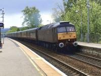 Train 1Z46 rushes through Bridge of Allan on 13 May 2011. The Compass Tours <I>'North Wales Scotsman'</I> was en route from Holyhead to Dundee behind WCRC 47804.<br><br>[Brian Forbes 13/05/2011]