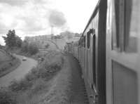 The RCTS <I>Borders Railtour</I> of 9 July 1961, hauled by NBR 256 Glen Douglas and J37 64624, returning from a visit to Greenlaw. The photograph was taken just west of Earlston heading for St Boswells [see image 31691], with the A68 road on the left.<br><br>[K A Gray 09/07/1961]
