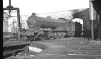 One of the mighty Raven Q7 0-8-0s, no 63472, photographed on the roofless Tyne Dock shed in 1960. These powerful locomotives were eventually displaced from the Tyne Dock - Consett iron ore trains following the arrival of the BR Class 9F 2-10-0s in the late 1950s. Tyne Dock shed was officially closed by BR in September 1967.<br><br>[K A Gray //1960]