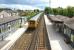 View south from the footbridge at Ainsdale station on a warm and sunny 26 June 2011 as a Southport - Liverpool Central service pulls away from the platform.<br><br>[John McIntyre 26/06/2011]