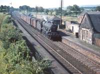 Jubilee 45728 <I>Defiance</I> heads north through Lochside with a freight in the summer of 1959.<br><br>[A Snapper (Courtesy Bruce McCartney) 22/08/1959]