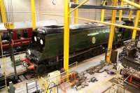 Bulleid 'Battle of Britain' Pacific no 34051 <I>Winston Churchill</I> receives attention in the NRM workshops at York on 29 June 2011. The locomotive is part of the national collection.<br><br>[John Furnevel 29/06/2011]