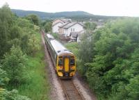 The 1236 service from Wick (and Thurso) departs from Alness and heads for Dingwall. This photograph of unit 158709 was taken from the academy footbridge that spans the line at the station and offers this view to the south. <br><br>[Mark Bartlett 29/06/2011]