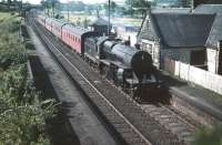 Crab 2-6-0 no 42809 with a Glasgow bound passenger train running north through the closed Lochside station in August 1959. Reopened in 1966, this is the present day Lochwinnoch station (name changed in 1985).<br><br>[A Snapper (Courtesy Bruce McCartney) 28/08/1959]