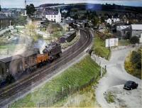 A freight approaches Totnes from the west. This photograph is on the wall of the office in TTS Tyre Services nearby the station - many thanks for allowing me to photograph it. Photographer and date unknown.<br><br>[Ewan Crawford //]