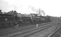 Britannia Pacific no 70023 minus its <I>Venus</I> nameplate, together with a selection of other ex-works locomotives heading through Doncaster station on 8 July 1961 on their way to 36A shed. <br><br>[K A Gray 08/07/1961]