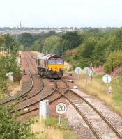 66154 crosses from down to up lines at Niddrie West on 29 July 2011 before heading for Portobello as part of a turning manoeuvre on the Millerhill / Niddrie West / Portobello / Millerhill triangle.<br><br>[John Furnevel /07/2011]