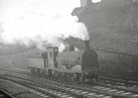 A J36 0-6-0, heads north past Castlehill Junction Ardrossan in November 1962. The locomotive is thought to be no 65273, allocated to 67D from March 1962 until withdrawal in September 1963. Ardrossan Town station is off picture to the left [see image 29400].<br><br>[R Sillitto/A Renfrew Collection (Courtesy Bruce McCartney) /11/1962]