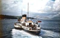 The paddle steamer <I>Jupiter</I>, built on the Clyde by Fairfield, Govan, for the Caledonian Steam Packet Co in 1937. The ship is seen here heading out of Rothesay on 25 September 1955 and will soon turn sharply to starboard making for Wemyss Bay.<br><br>[A Snapper (Courtesy Bruce McCartney) 25/09/1955]