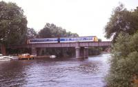 A DMU crossing the River Thames north of Wargrave station in August 1989. The train is operating the branch service between the junction with the GWR main line at Twyford and the terminus at Henley-on-Thames. <br><br>[Ian Dinmore /08/1989]