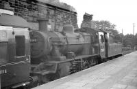 With less than two years to go before the last scheduled passenger train over the through route, a departure for Berwick via Kelso waits in the bay at the south end of St Boswells station on 10 September 1962. Locomotive in charge is Hawick's standard class 2 2-6-0 no 78049.<br><br>[R Sillitto/A Renfrew Collection (Courtesy Bruce McCartney) 10/09/1962]