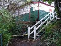 For a small halt there is a substantial wooden waiting room on the platform. The waiting shelter is mounted on built up foundations and wooden steps alongside give access to platform level. There is also a flight of steps from the road, so definitely not a step free access station.<br><br>[David Pesterfield 06/12/2011]