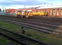 This rather generous yard is still in place behind platform 2 at Worcester Shrub Hill station in December 2011. Don't worry, it's fully utilized: as well as these PW machines, there was a wagon stabled out of view.<br><br>[Ken Strachan 31/12/2011]