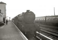 Tweedmouth based V2 2-6-2 no 60865 arrives at Berwick from the south in September 1962.<br><br>[R Sillitto/A Renfrew Collection (Courtesy Bruce McCartney) 10/09/1962]