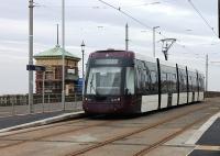 Although the tramway in Blackpool has not yet reopened the new <I>Flexity</I> trams are out and about on driver training runs. 002 pauses at Cabin on one of these duties on 14 February 2012. When the line reopens and these new units are running side by side with the heritage trams on the Pleasure Beach to Bispham section it will be interesting to see which ones the holidaymakers go for. Will they hop on a new tram or hang back for an old one? [See image 31152]<br><br>[Mark Bartlett 14/02/2012]