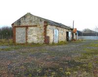The surviving goods shed at Kilmaurs in February 2012. The station is to the left.<br><br>[Ken Browne 08/02/2012]