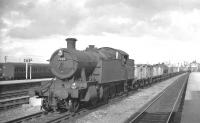 Collett 2-8-2T no 7228 passing through Swindon station with a down freight in October 1961.<br><br>[K A Gray 06/10/1961]