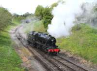 The repainted 'Turkish' Stanier 8F - seen here as LMS 8274 - running round at Winchcombe on 6 May 2012. [See image 37052] <br><br>[Peter Todd 06/05/2012]