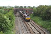 Down coal empties on the Great Western main line close to Juction 16 of the M4 to the west of Swindon in June 2012.<br><br>[Peter Todd 16/06/2012]