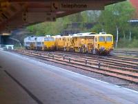 Track machines getting on with their 6-day snooze round the back of Leicester station. View from platform 4 on a Friday afternoon in April 2012.<br><br>[Ken Strachan 27/04/2012]