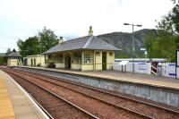 The scaffolding of last year has all now gone from Glenfinnan Station leaving it looking neat and tidy. The work involved the refurbishment of the listed station building and signal box including the removal and reinstallation of their slate roofs.<br><br>[John Gray /06/2012]