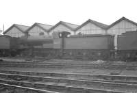 J6 0-6-0 no 64277 stands on Copley Hill shed (56C), Leeds, thought to be in the early 1960s. The locomotive was officially withdrawn from here in June 1962. <br><br>[K A Gray //]