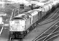 Freight for the north leaving Millerhill down yard in November 1972 behind a pair of type 2 locomotives.<br><br>[John Furnevel 03/11/1972]