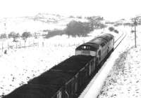 A coal train nearing the village of Patna in the winter of 1971 on its way from Waterside to Ayr Harbour.<br><br>[John Furnevel 01/12/1971]