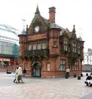 St Enoch Subway - the original building in July 2005, now a travel Centre. The glass palace on the left stands on the site of the former main line station.<br><br>[John Furnevel 02/07/2005]