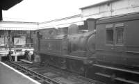 Adams 0-4-4T no 30 <I>Shorwell</I> simmers at the buffer stops at Ryde Pier Head station in the summer of 1961.<br><br>[K A Gray 16/08/1961]