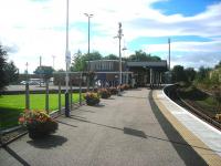 View west at Forres on 11 September showing some of the impressive floral work carried out by <I>'Forres in Bloom'</I>. [See image 40288]<br><br>[John Yellowlees 11/09/2012]