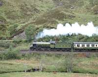 Neither K1 No. 62005 running as LNER No. 2005 in apple green nor the rake of Mk 1 coaches in the LNER tourist livery was strictly authentic in appearance, but they did at least make a harmonious ensemble. Here the westbound <I>'Lochaber'</I> is on the climb away from Glenfinnan on 2 June 1988, shortly before breasting the summit and starting the descent towards the south shore of Loch Eilt.<br><br>[Bill Jamieson 02/06/1988]