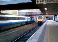 The old (an HST forming the 17.57 to St.Pancras) and the new ( a class 222 forming the 18.04 to Sheffield) meet at the venerable Leicester station on 15th September.<br><br>[Ken Strachan 15/09/2012]