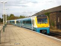 Arriva Trains 175002, extensively damaged in the 2011 Whitland level crossing crash, has now been repaired. The unit is seen here on 1 October bringing up the rear of the 16.02 service departing from Wrexham General bound for Chester <br><br>[David Pesterfield 01/10/2012]