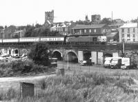 429 approaching Carlisle station with a train from the north in August 1972. In the foreground are some of the remains of the Caledonian Railway's former Viaduct Yard.<br><br>[John Furnevel 22/08/1972]