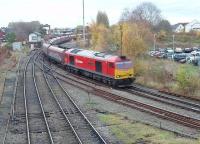 Having just run round its train of empties from Fiddlers Ferry at Latchford Sidings, DBS 60040 runs back through Arpley Junction but turns left for Arpley Yard.<br><br>[Mark Bartlett 13/11/2012]