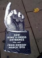 Just remind me, which century are we in? This Victorian-style sign on the pavement directs passengers to the new King's Cross passenger entrance. It is standing up to footfall rather well - it must have been there for about eight months.<br><br>[Ken Strachan 09/11/2012]