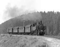 One of the last steam strongholds in Austria was Schwarzenau, a sub-shed of Gmnd in the north east of the country, which employed lightweight 2-8-2Ts of class 93.13 on branches off the Vienna to Prague main line. Here No. 93.1414 is seen soon after departing from Zwettl, some 22km south of Schwarzenau, on 9 September 1975 with the early afternoon train to Martinsberg-Gutenbrunn. <br><br>[Bill Jamieson 09/09/1975]